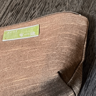 柿渋染め絣ポーチ小 K26009 | iichi 日々の暮らしを心地よくする