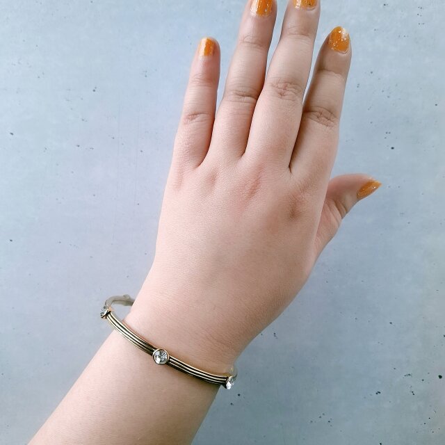 MONET》 gold four line clear rhinestone モネ ヴィンテージバングル