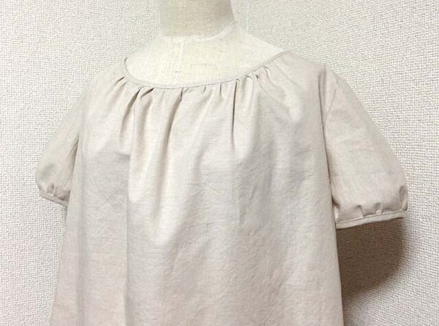 裾からリバティの葉チュニックの画像1枚目