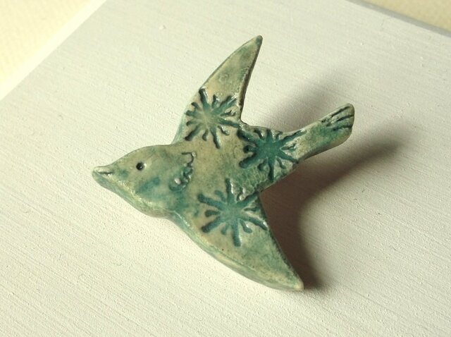 陶ブローチ-星の鳥の画像1枚目