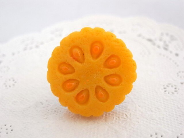 オレンジクッキーのデコパーツのリング フリーサイズの画像1枚目