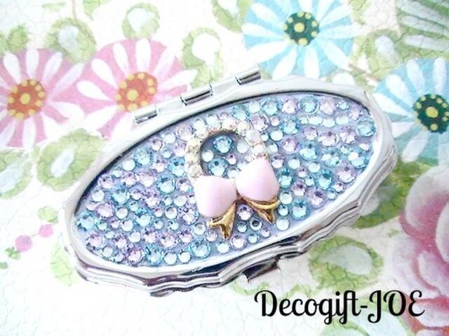 スワロフスキーデコ 波型ピルケース リボン アクアマリンの画像1枚目