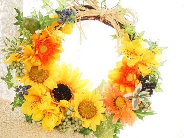 S様ご予約品*ビタミンカラーが可愛い向日葵の華やかリースの画像1枚目