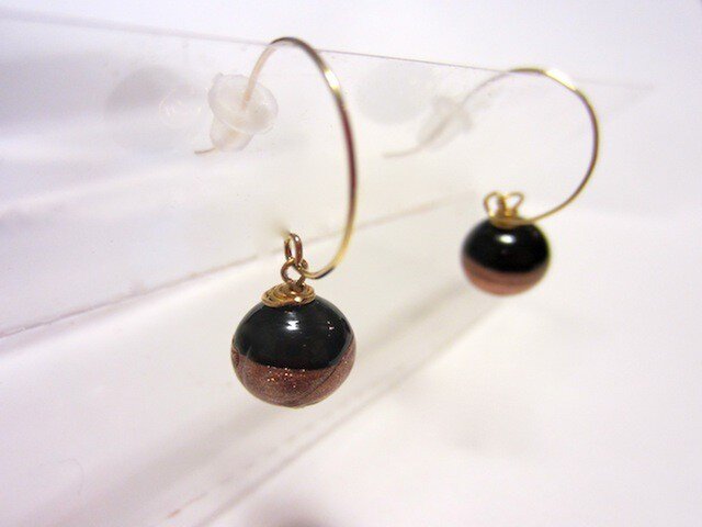 gold black pierceの画像1枚目