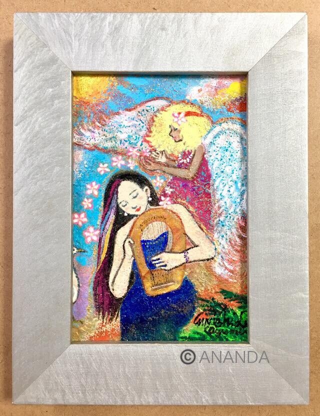 【ハワイの天使とライアーを弾く女性】の画像1枚目