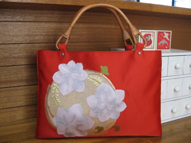 sold out 朱色の帯のバッグ 花モチーフの画像1枚目