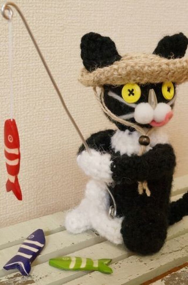 釣り猫(白黒)の画像1枚目
