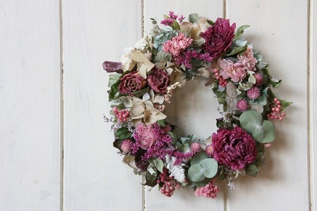 ピンクのお花のリースの画像1枚目