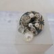 button brooch(ame)の画像