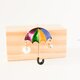 『ロマンチックな雨の日〜虹色の傘のブローチ』の画像
