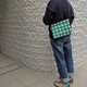 グリーンドットと黒ナイロンのミニサコッシュの画像