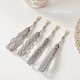 yumri ⌘ macrame パールビーズ玉マクラメレース　ストラップ［4本セット］グレーの画像