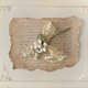 〈染め花〉スズランとスミレとくしゅくしゅリボンのコサージュ(オフホワイト)の画像