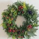 [再出品]木の実のクリスマスリースの画像