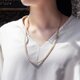 真珠とサージカルステンレスによる60cmバイカラーマンテルネックレス　～三日月の画像