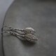 カレンシルバーとレースのようなフィリグリーのピアス（silver925）orイヤリングの画像