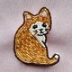 猫のブローチの画像