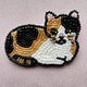 三毛猫のブローチの画像