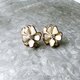 P668-ヴィンテージピアス U.S.A. Gold Tone White Enamel Rhinestone Flowerの画像
