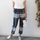形のきれいな手織りコットンのテーパードタックパンツ【ワイドチェック】の画像