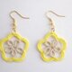 yellow flower pierced ringの画像