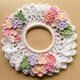 ハンドメイド☆春の桜色レース編みシュシュ 手編み フラワー アクセサリー ヘアゴムの画像